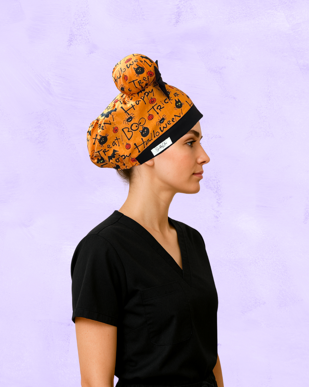 HalloQueen ScruBunz – Featuring Playful Pumpkins & Halloween Lettering Scrub Cap for Nurses with Orange & Black Accents