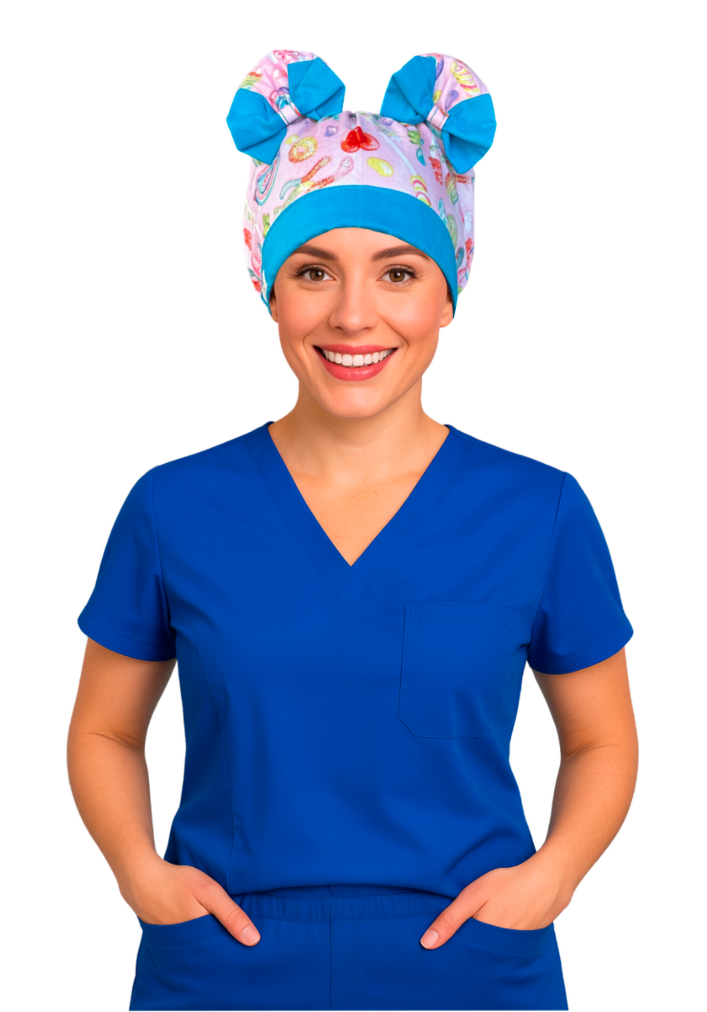 Smiling nurse wearing Sugar Pop ScruBunz with signature double buns, pink fabric with colorful candy, and bright blue trim