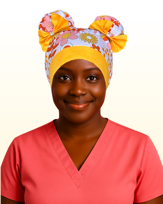 European style scrub cap in Groovy Bloom print with yellow, orange, and white flowers