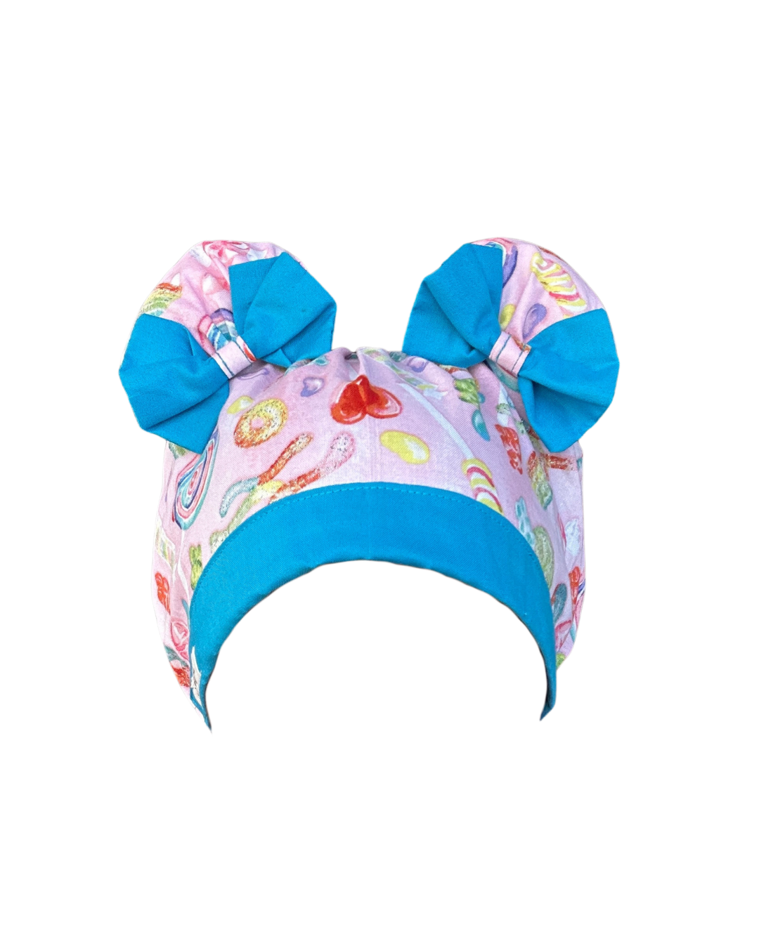 ScruBunz scrub cap with two space buns, pink background, colorful candy print, and sky blue accent trim