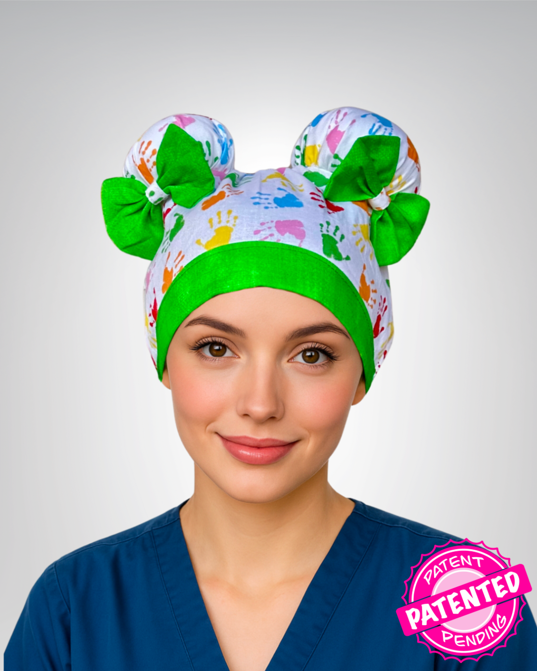 Happy Hands ScruBunz - fearturing Colorful Baby Handprint Pattern with Green Accents on white background