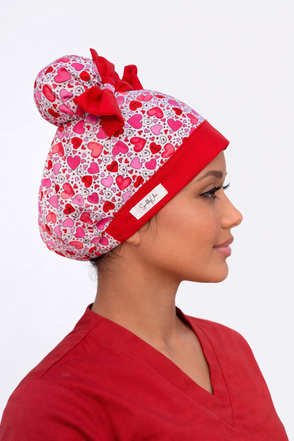 Heart Print Scrub Cap – Double Bun ScruBunz | Cute Girly Nurse Hat with Red Bows, Handmade Surgical Cap, OR Cap for Women