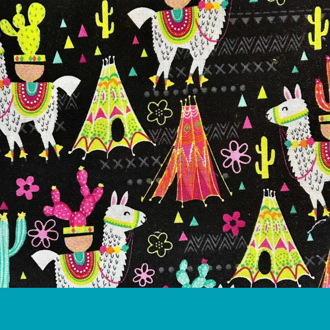 Close up of ScruBunz scrub cap pattern with black background, playful llamas, green tents, and colorful cacti