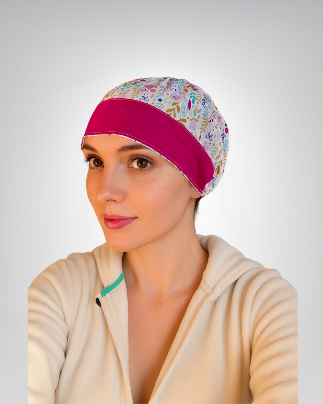 Traditional European-style scrub cap with gold, turquoise, and pink flowers and leaves on a white background
