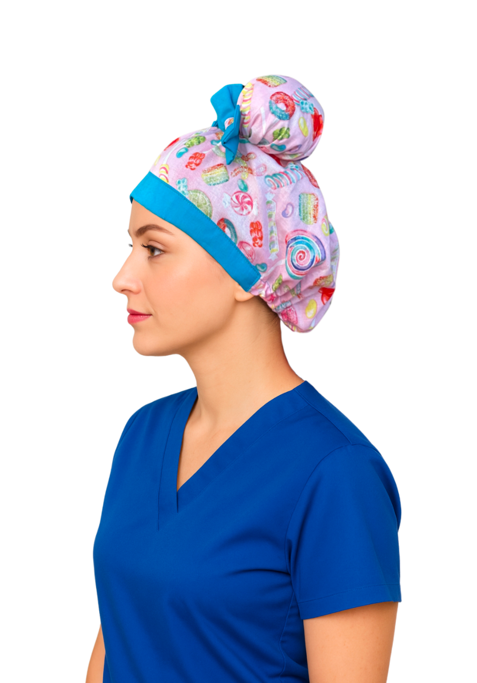 Side view of nurse wearing Sugar Pop ScruBunz with pink candy print, sky blue trim, and two space buns visible from the side