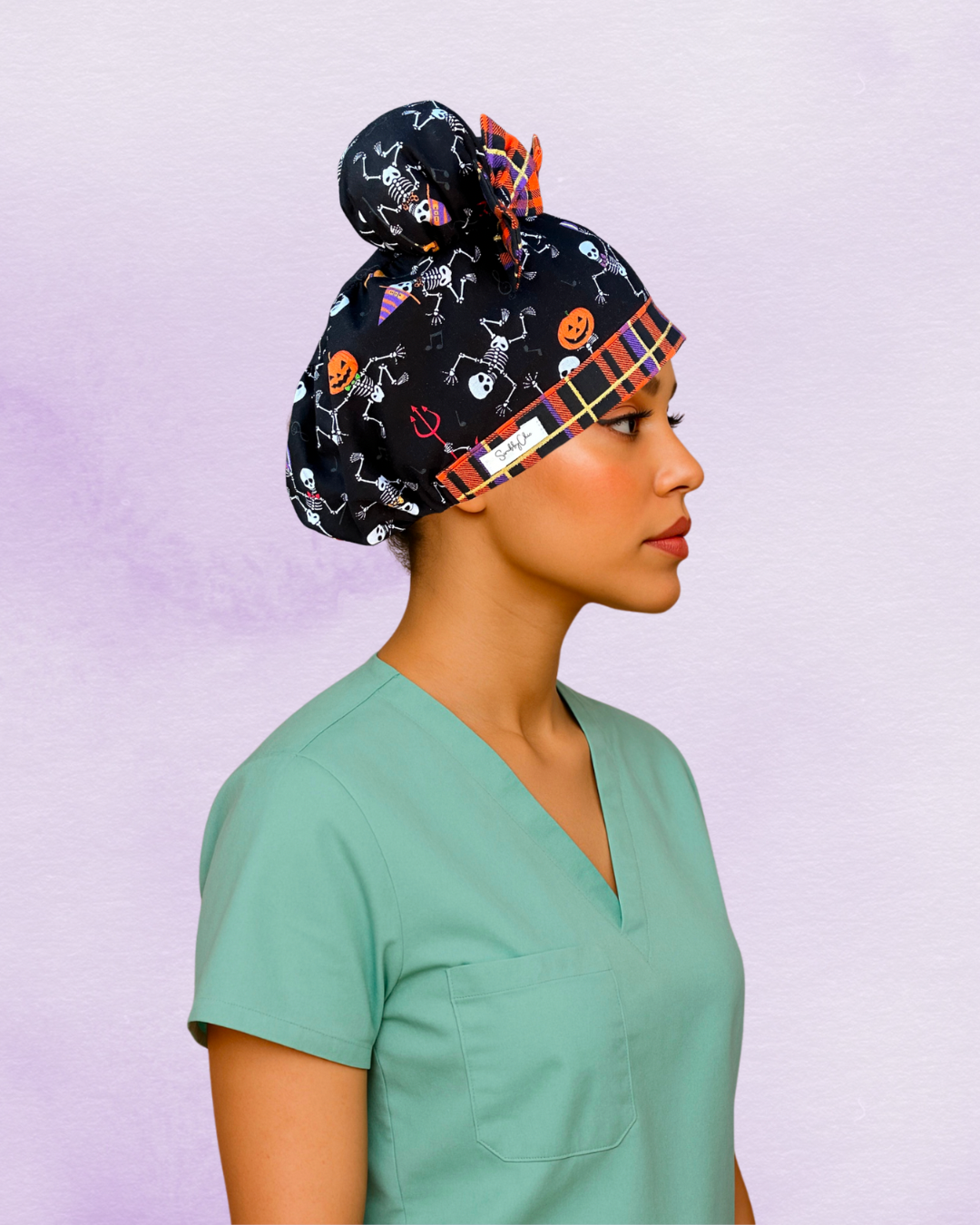Bone Dance ScruBunz – Handmade Halloween Scrub Cap for Nurses with Dancing Skeletons, Pumpkins & Plaid Bows