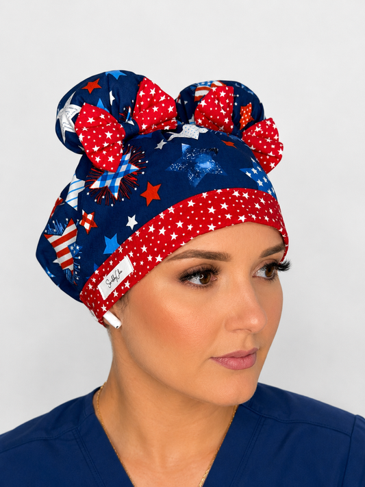 Star Spangled Sweetie ScruBunz – Patriotic Scrub Cap for Nurses with Removable Buns & Red White Blue Firework Print